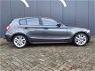 BMW 1-serie - 120d Graphite LEER airco LMV NAVIGATIE BOMVOL - 1 - Thumbnail