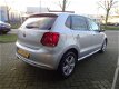 Volkswagen Polo - 1.2 TSI MATCH AIRCO ECC / CRUISE / PDC / - 1 - Thumbnail