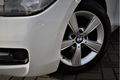 BMW 1-serie - 116i Sport / Trekhaak / Parkeersens. / Stoelverwarming - 1 - Thumbnail