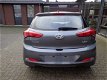 Hyundai i20 - 1.4i i-Vision 101PK LED/CRUISE C./TEL - 1 - Thumbnail