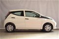Toyota Aygo - 5-DEURS 1.0 VVTI X-FUN COOL WHITE AIRCO - 1 - Thumbnail
