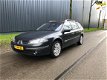 Renault Laguna Grand Tour - 2.0-16V T Tech Line LPG, Automaat, Xenon, Navigate, Pano, Leder, Full Op - 1 - Thumbnail