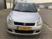 Suzuki Swift - 1.5 GLS 1ste eigenaar, Autmaat, 4 deur, weining km, Airco, Elek ramen, radio CD spele - 1 - Thumbnail