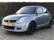 Suzuki Swift - 1.3 Exclusive 5DEURS AIRCO MF STUURWIEL - 1 - Thumbnail