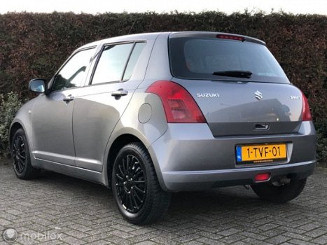 Suzuki Swift - 1.3 Exclusive 5DEURS AIRCO MF STUURWIEL - 1