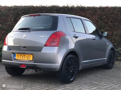 Suzuki Swift - 1.3 Exclusive 5DEURS AIRCO MF STUURWIEL - 1