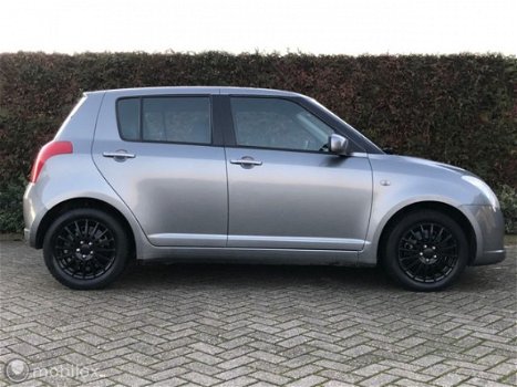 Suzuki Swift - 1.3 Exclusive 5DEURS AIRCO MF STUURWIEL - 1