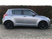 Suzuki Swift - 1.3 Exclusive 5DEURS AIRCO MF STUURWIEL - 1 - Thumbnail