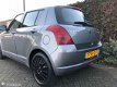 Suzuki Swift - 1.3 Exclusive 5DEURS AIRCO MF STUURWIEL - 1 - Thumbnail