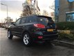 Hyundai Santa Fe - 2.7i V6 4WD Style 7p. LPG/AUTOMAAT/ELEK.RAMEN.SPIEGELS/7-ZITS/LMV/LEDER/NAP/NAVI/ - 1 - Thumbnail