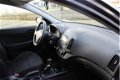 Hyundai i30 CW - 1.4i i-Drive Cool / AIRCO / AUDIO / EL. PAKKET / TREKHAAK / PDC / * APK 07-2020 - 1 - Thumbnail