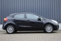 Kia Rio - 1.4 CVVT BusinessLine AUTOMAAT/AIRCO/CRUISE/TREKHAAK - 1 - Thumbnail