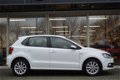 Volkswagen Polo - 1.2 TSI Lounge Navi Airco Pdc - 1 - Thumbnail