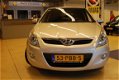 Hyundai i20 - 1.4i DynamicVersion AIRCO CRUISECONT WINTBND PDC - 1 - Thumbnail