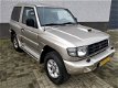 Mitsubishi Pajero - 2.8 GLS High Roof Lage kilometers Airco cruise control - 1 - Thumbnail