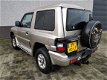 Mitsubishi Pajero - 2.8 GLS High Roof Lage kilometers Airco cruise control - 1 - Thumbnail