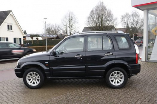 Suzuki Grand Vitara - 2.0 FreeStyle-3 4WD Automaat | Leer | onderh. hist. | -All-in prijs | Trekhaak - 1