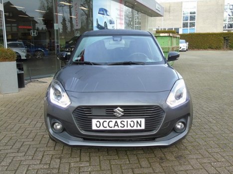 Suzuki Swift - 1.2 Smart Hybrid Stijl | NAVI | STOELVERWARMING | CAMERA - 1