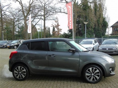 Suzuki Swift - 1.2 Smart Hybrid Stijl | NAVI | STOELVERWARMING | CAMERA - 1