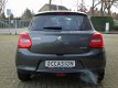 Suzuki Swift - 1.2 Smart Hybrid Stijl | NAVI | STOELVERWARMING | CAMERA - 1 - Thumbnail