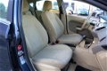 Ford Fiesta - 1.25 Ghia 5 Deurs, Airco, NL Auto, Navi - 1 - Thumbnail