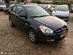 Hyundai Accent - 1.4i, Airco, Trekhaak, cruis, parkeersensoren - 1 - Thumbnail