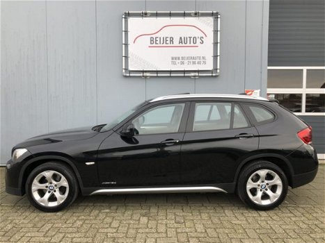 BMW X1 - xDrive18d Business Navigatie/PDC/Xenon/Climate - 1