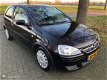 Opel Corsa - 1.2-16V Sport - 1 - Thumbnail