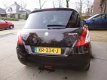 Suzuki Swift - 1.2 EXCLUSIVE STOP en START CLIMA/CRUISE/PDC - 1 - Thumbnail