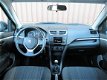 Suzuki Swift - 1.2 Dynamic Easss (Airco, stoelverwarming) - 1 - Thumbnail