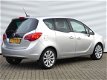 Opel Meriva - 1.4 Turbo Cosmo Leder | Navi | Winterpakket | Parkeersensoren voor & achter - 1 - Thumbnail