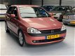 Opel Corsa - 1.2-16V Elegance Nap 3de eigenaar - 1 - Thumbnail