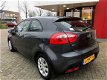 Kia Rio - 1.2 CVVT Comfort Pack Airco 29523 km Leuke Sportieve Rio met 29523 km - 1 - Thumbnail