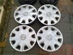 4 Stalen Velgen Opel Corsa D Astra 14 inch 4x100 Wieldoppen - 1 - Thumbnail