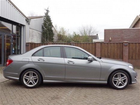 Mercedes-Benz C-klasse - 180 Ambition Avantgarde AMG-Pakket 156 Pk Airco Navi Xenon Pdc 111 dkm Nap - 1