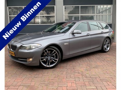 BMW 5-serie Touring - 520d High Executive airco, cruise control, navigatie, stuurwielbediening, stoe - 1