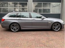 BMW 5-serie Touring - 520d High Executive airco, cruise control, navigatie, stuurwielbediening, stoe