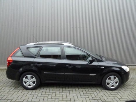 Kia Cee'd Sporty Wagon - Airco/Audio/1e eig - 1