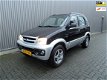 Daihatsu Terios - 1.3 DX Airco/LMV/zeer nette auto/ kleur zwart/zilver - 1 - Thumbnail