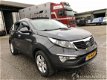 Kia Sportage - 2.0i 163pk 2wd x-ecutive panoramadak dubbel - navi - half leer - clima - cruise - tre - 1 - Thumbnail