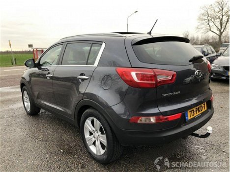 Kia Sportage - 2.0i 163pk 2wd x-ecutive panoramadak dubbel - navi - half leer - clima - cruise - tre - 1