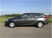 Opel Astra Sports Tourer - 1.4 Anniversary Ed. 2012 met Navi/Airco/Elek pakket - 1 - Thumbnail