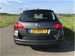 Opel Astra Sports Tourer - 1.4 Anniversary Ed. 2012 met Navi/Airco/Elek pakket - 1 - Thumbnail