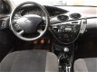 Ford Focus - 1.6-16V Luxe uitvoering Opendak | 2e eigenaar - 1 - Thumbnail