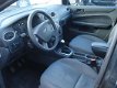 Ford Focus Wagon - 1.4-16V Ambiente - 1 - Thumbnail