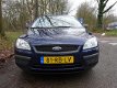 Ford Focus - 1.4 16V Ambiente - 1 - Thumbnail