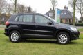 Volkswagen Tiguan - 1.4 TSI Comfort&Design *Trekhaak, Cruise control, Climate control - 1 - Thumbnail