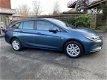 Opel Astra Sports Tourer - 1.0 Edition Met Navi+PDC - 1 - Thumbnail