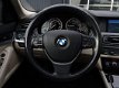 BMW 5-serie Touring - 520d High Executive Automaat | Pano | HUD | Camera - 1 - Thumbnail