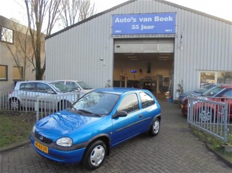 Opel Corsa - 1.2i-16V Strada - 1